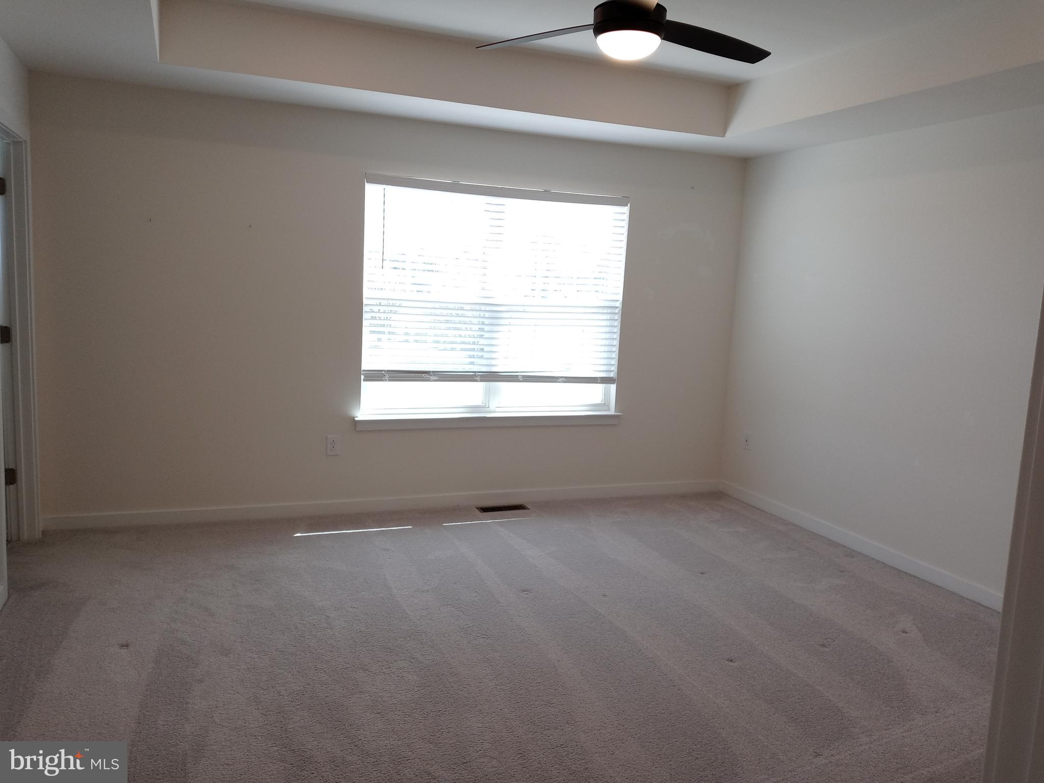 1908 Boulder Drive Downingtown, PA 19335 - Photo 18 of 27 an empty room with a window