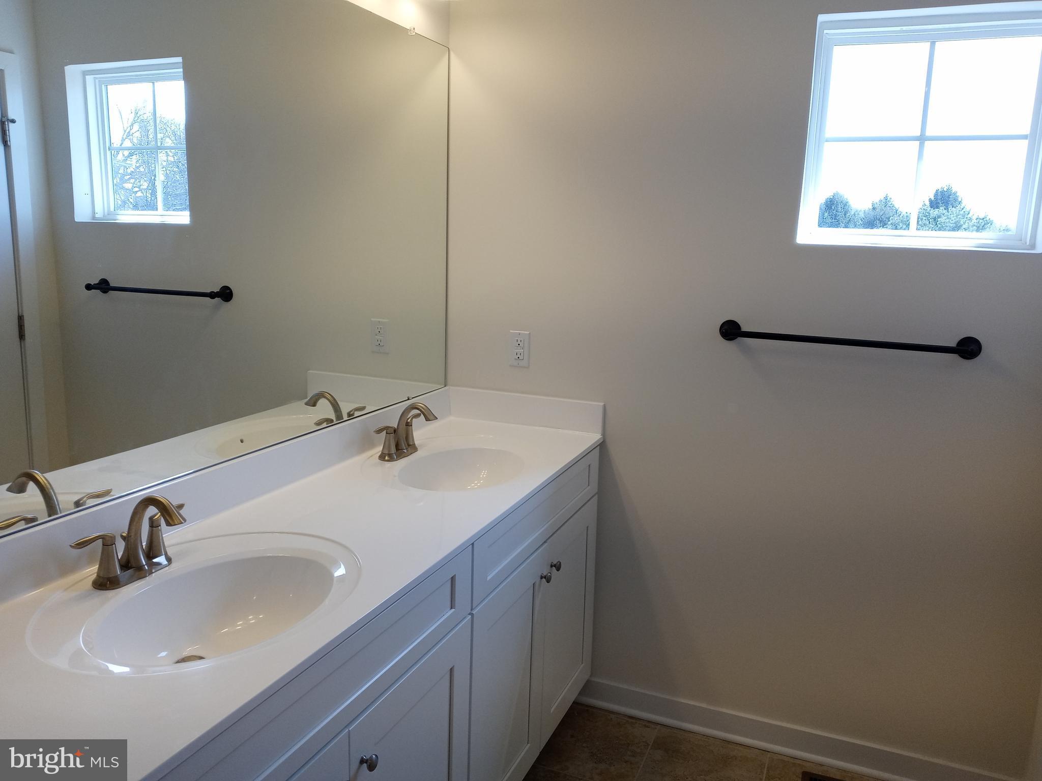 1908 Boulder Drive Downingtown, PA 19335 - Photo 22 of 27 a bathroom with a sink and a window