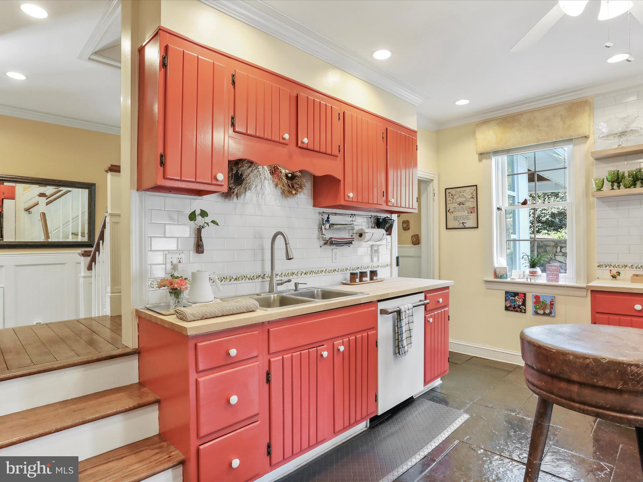 14946 Charmian Road Blue Ridge Summit, PA 17214 - Photo 19 of 56 a kitchen with a sink stove and cabinets