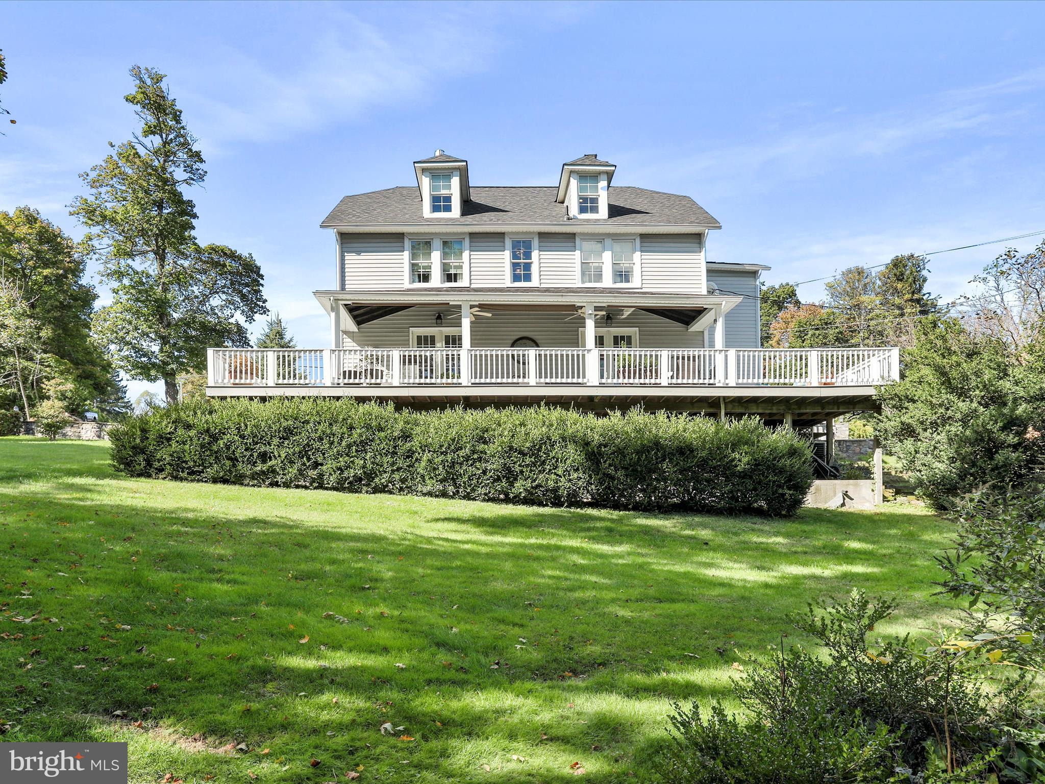 14946 Charmian Road Blue Ridge Summit, PA 17214 - Photo 2 of 56 a front view of a house with a yard