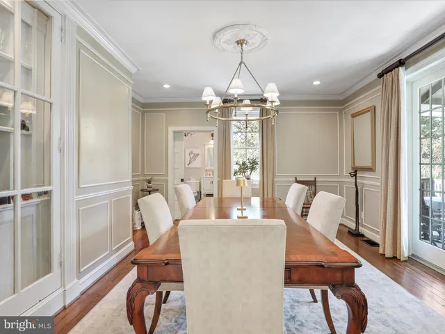 a bedroom with a bed and a table in it