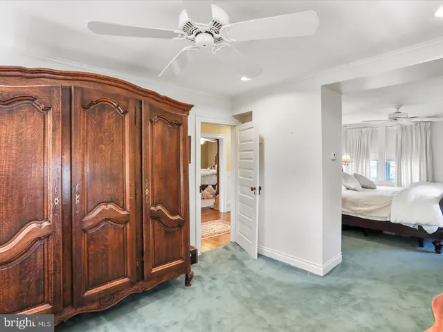 a bathroom with a shower and a sink