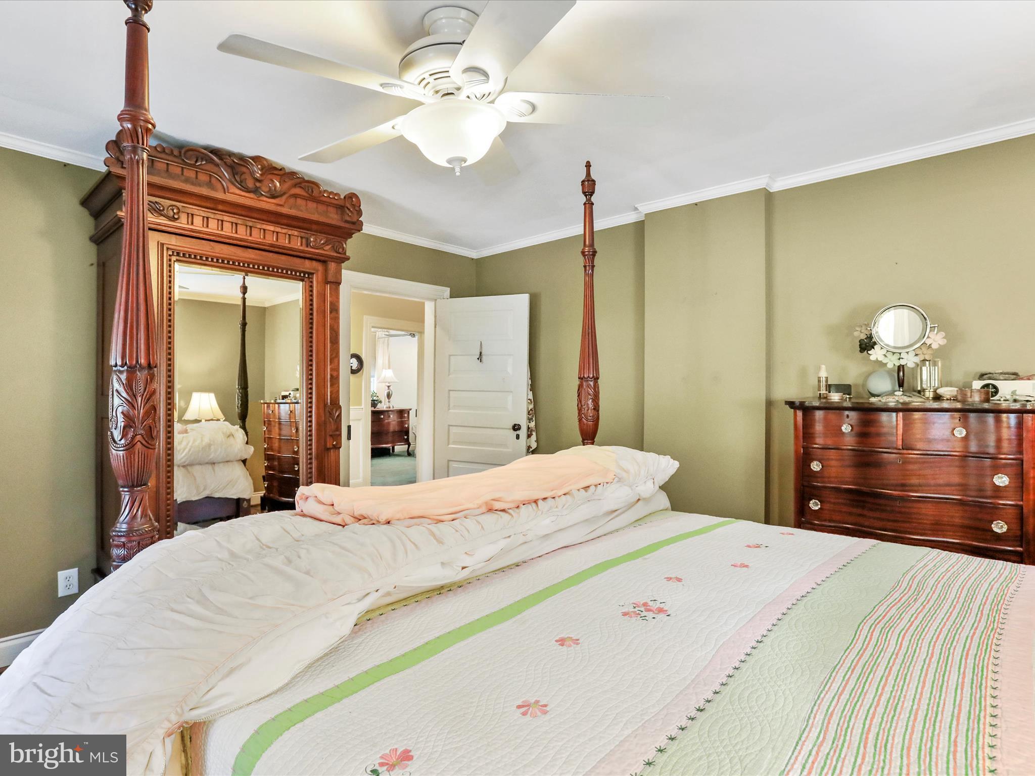 14946 Charmian Road Blue Ridge Summit, PA 17214 - Photo 32 of 56 a bedroom with a bed and wooden floor