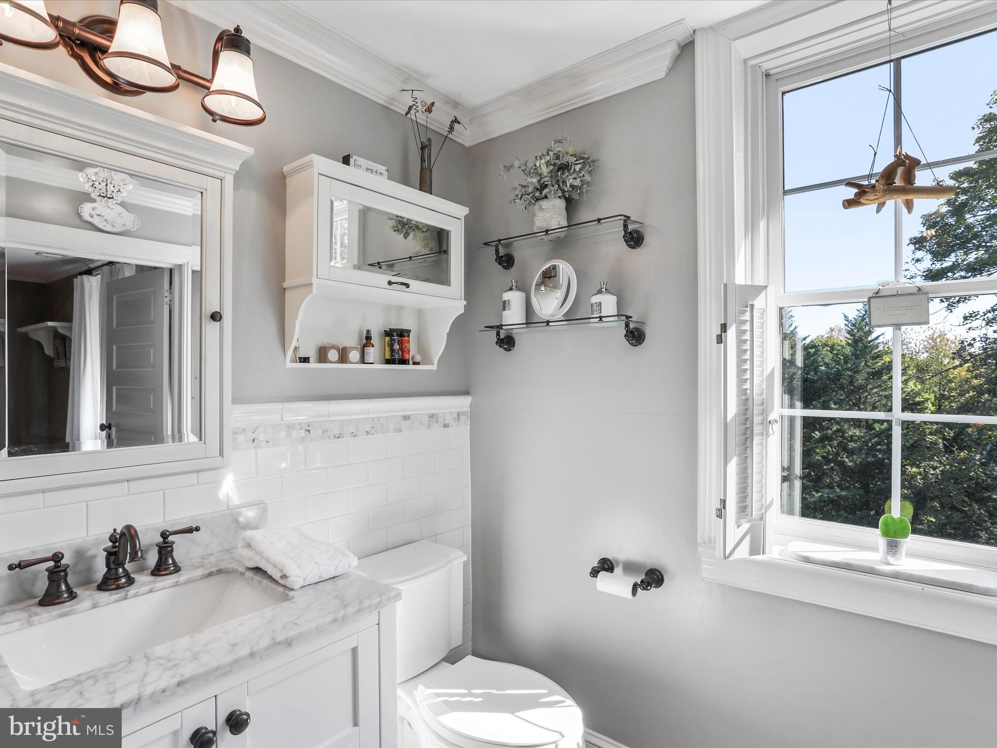 14946 Charmian Road Blue Ridge Summit, PA 17214 - Photo 37 of 56 a bathroom with a sink vanity granite and toilet