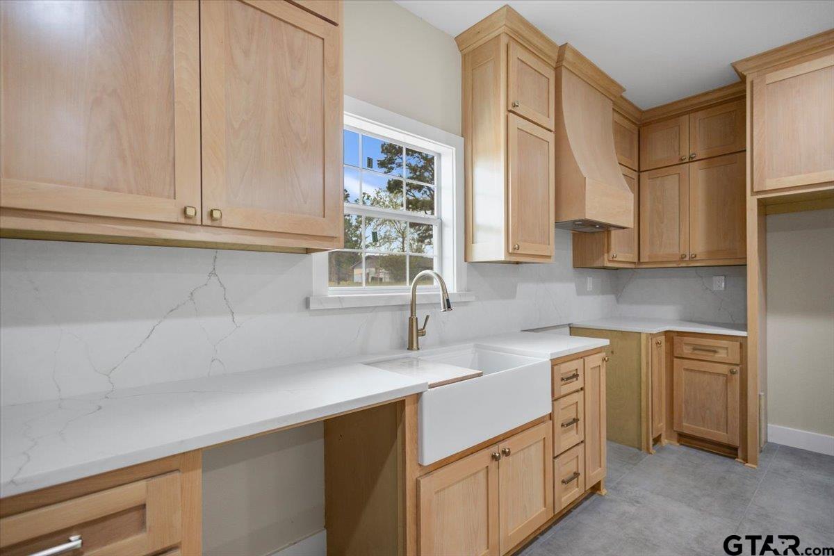 4123 County Road 1120 Tyler, TX 75704 - Photo 16 of 43 a kitchen with stainless steel appliances white cabinets and a sink