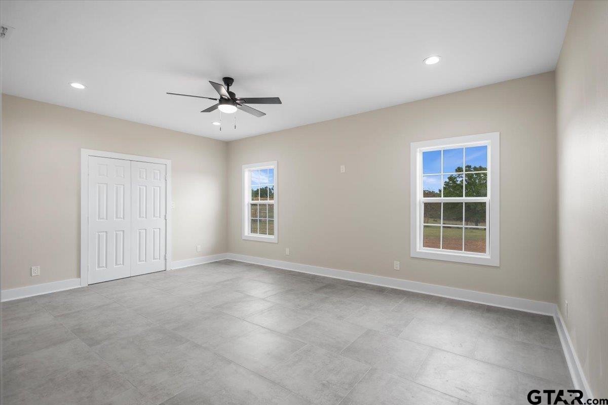 4123 County Road 1120 Tyler, TX 75704 - Photo 20 of 43 a view of an empty room with a window