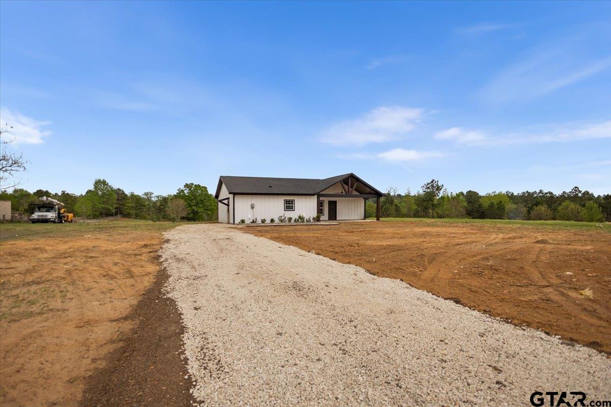 4123 County Road 1120 Tyler, TX 75704 - Photo 2 of 43 a house with lake view