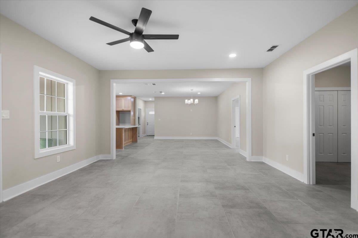 4123 County Road 1120 Tyler, TX 75704 - Photo 31 of 43 a view of an empty room with a window