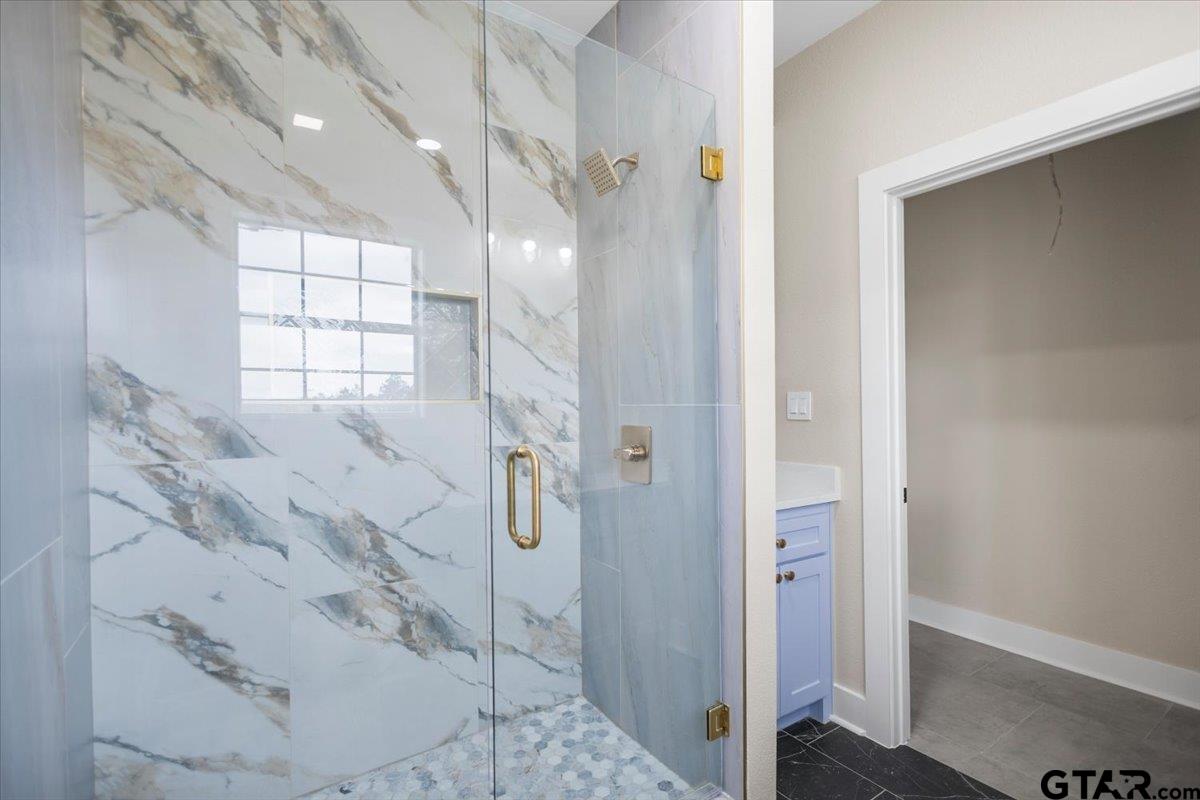 4123 County Road 1120 Tyler, TX 75704 - Photo 35 of 43 a bathroom with a shower