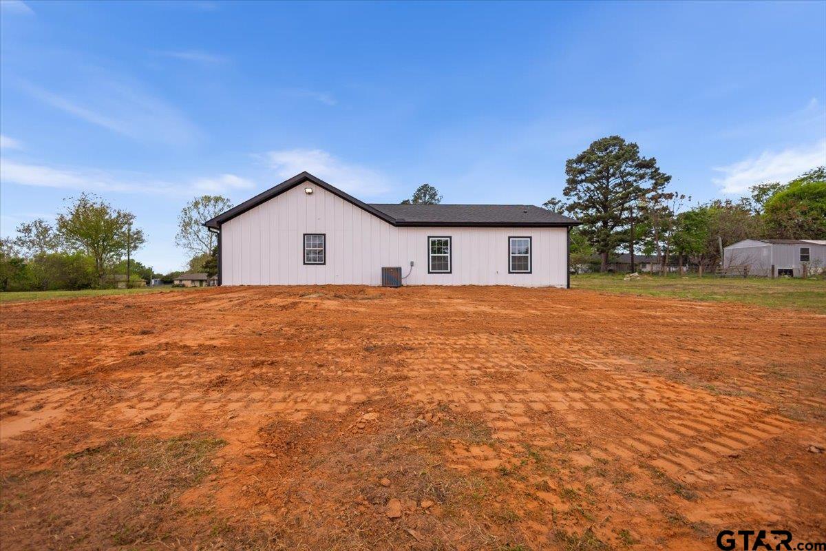 4123 County Road 1120 Tyler, TX 75704 - Photo 38 of 43 a house with a yard