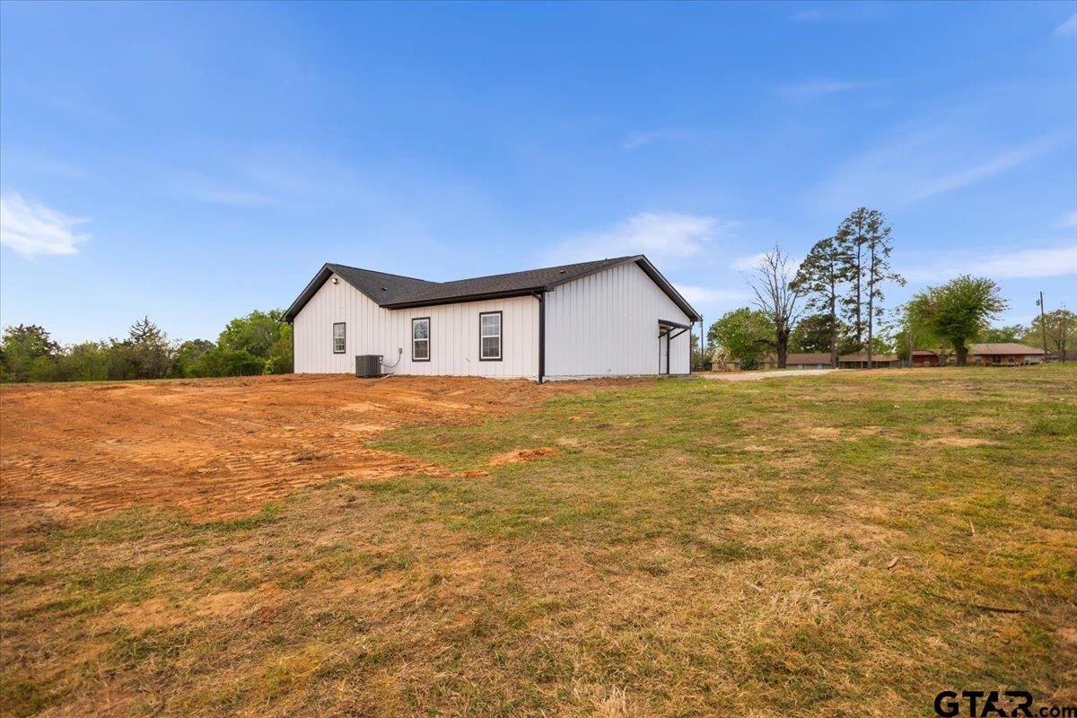 4123 County Road 1120 Tyler, TX 75704 - Photo 43 of 43 a view of a house with a yard
