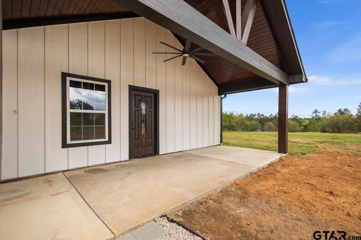4123 County Road 1120 Tyler, TX 75704 - Photo 6 of 43 a view of an empty room with a sink and a yard