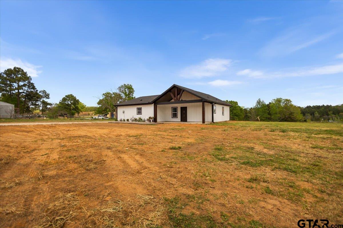 4123 County Road 1120 Tyler, TX 75704 - Photo 10 of 43 a house view with a garden space