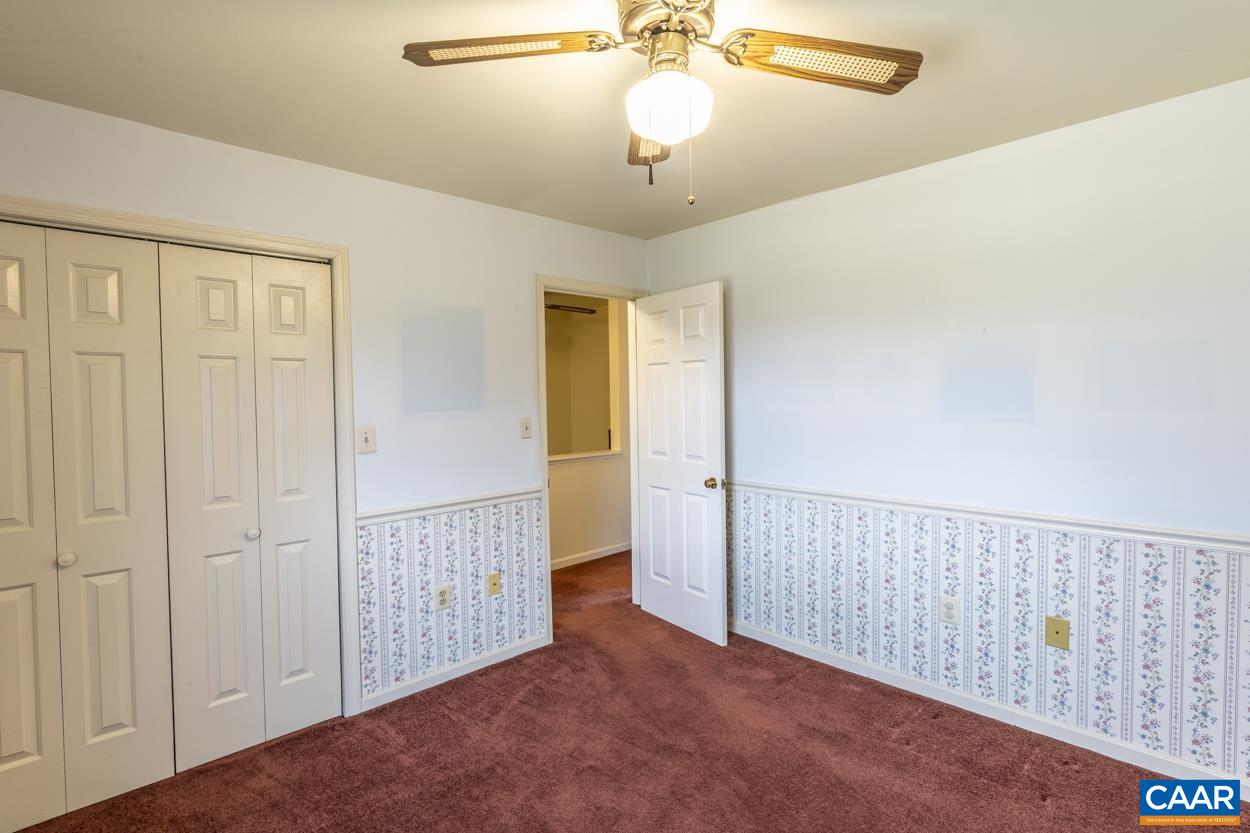 2011 Wilderness Road Reva, VA 22735 - Photo 53 of 75 a view of a hallway with a chandelier
