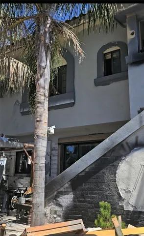 a kitchen with a stove and a microwave