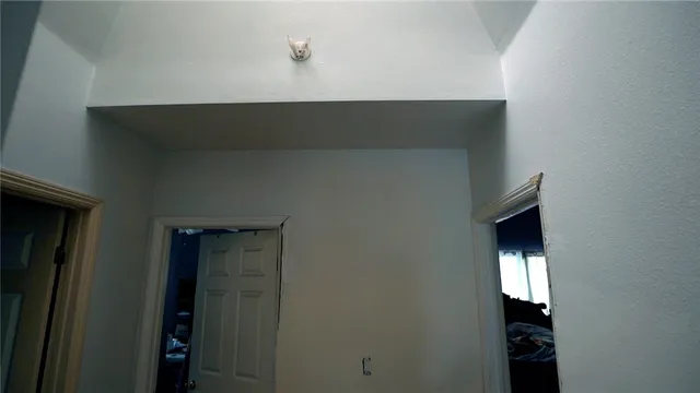 a white toilet sitting next to a bathroom sink