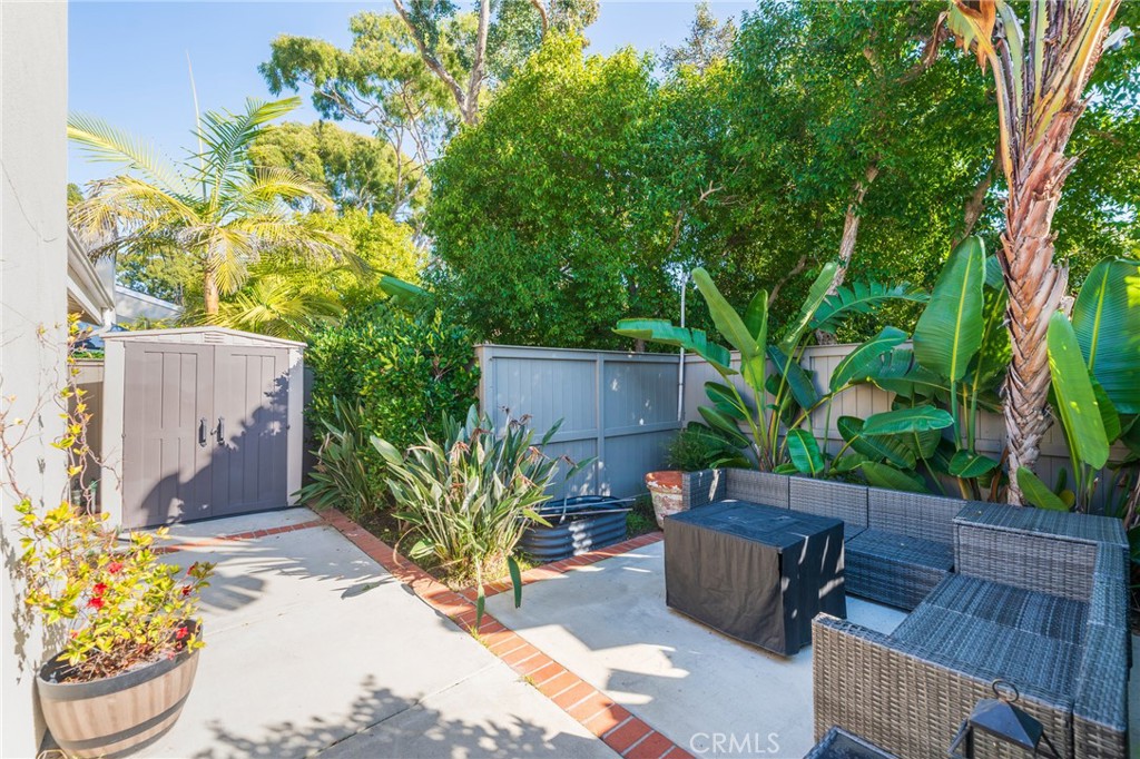 19916 Maritime Lane Huntington Beach, CA 92648 - Photo 19 of 43 a backyard with furniture and a garden