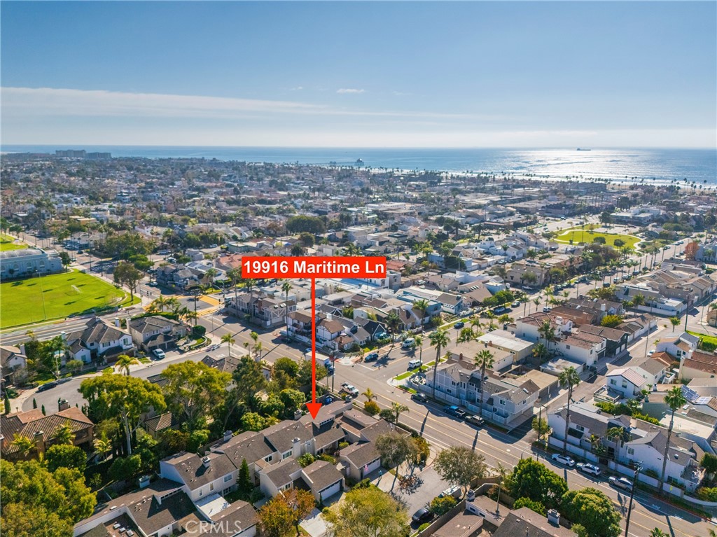 19916 Maritime Lane Huntington Beach, CA 92648 - Photo 24 of 43 an aerial view of residential building and lake