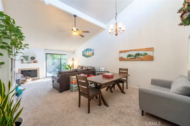 a view of a livingroom with furniture and a chandelier