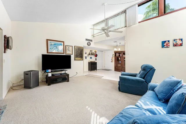 an empty room with fan