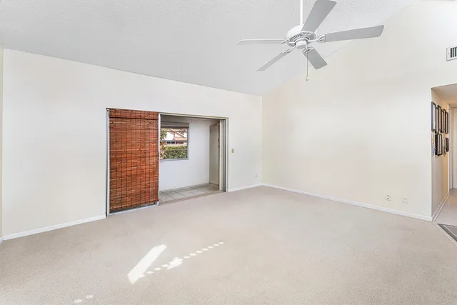 a view of balcony with furniture