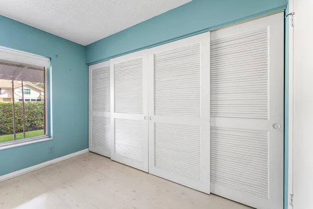 a view of a livingroom with wooden floor