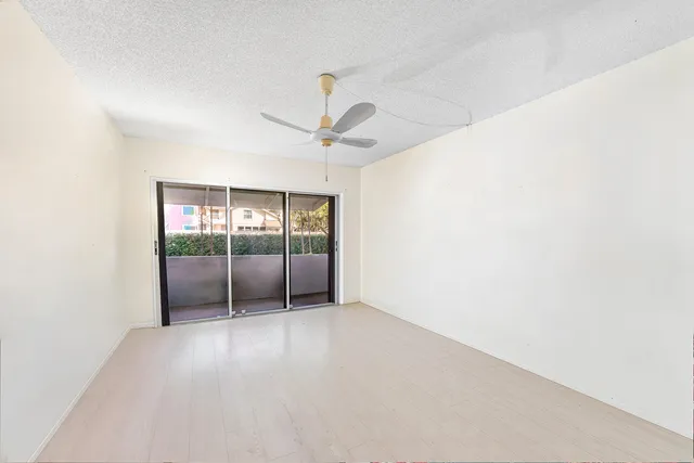 a bathroom with a shower and a toilet