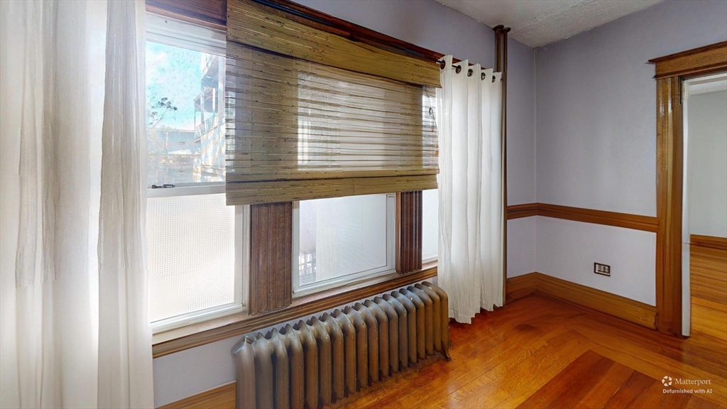 19 Mt Ida Road Boston, MA 02122 - Photo 31 of 36 a view of a hardwood & staircase