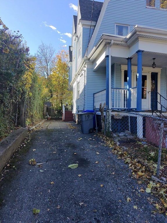 19 Mt Ida Road Boston, MA 02122 - Photo 35 of 36 a view of a house with a yard
