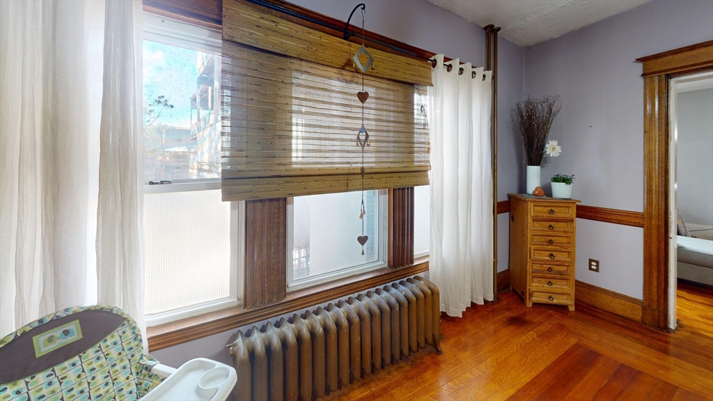 19 Mt Ida Road Boston, MA 02122 - Photo 5 of 36 a front view of a house with entryway