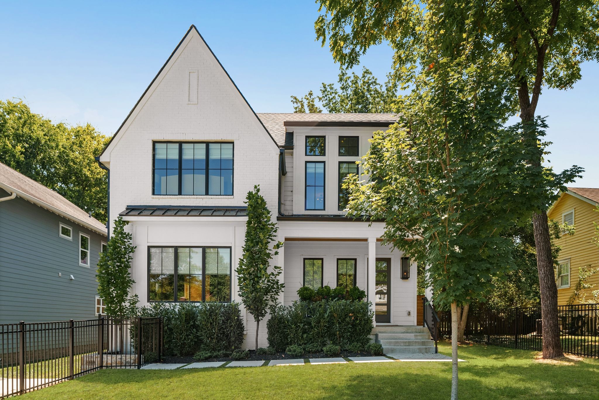4909 Dakota Avenue Nashville, TN 37209 - Photo 1 of 39 a front view of a house with a yard