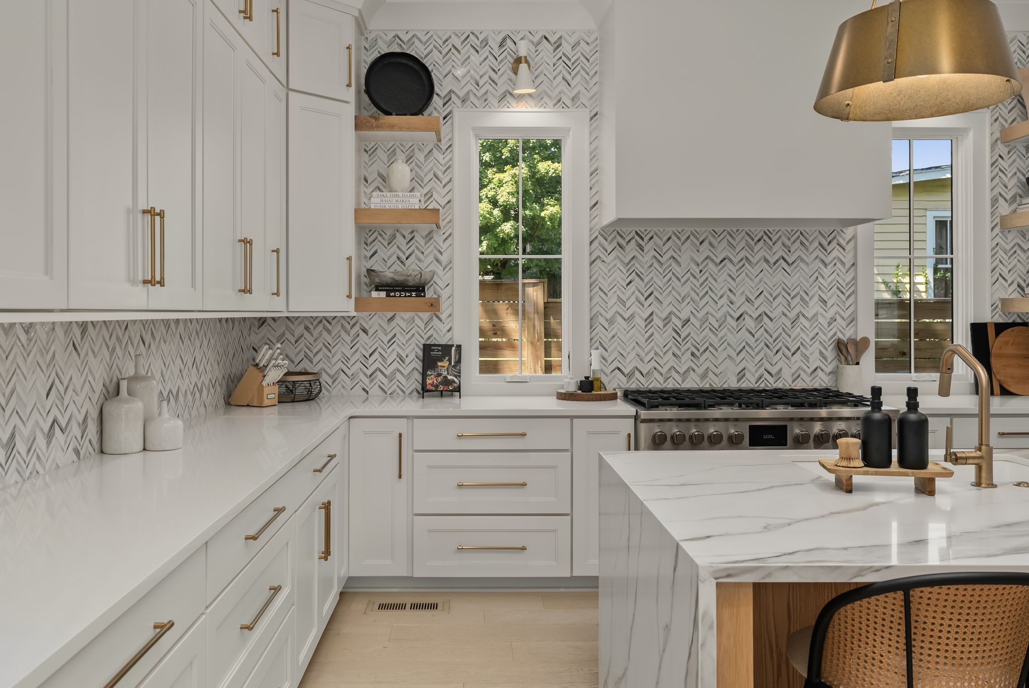4909 Dakota Avenue Nashville, TN 37209 - Photo 15 of 39 a kitchen with stainless steel appliances a stove a sink and a cabinets