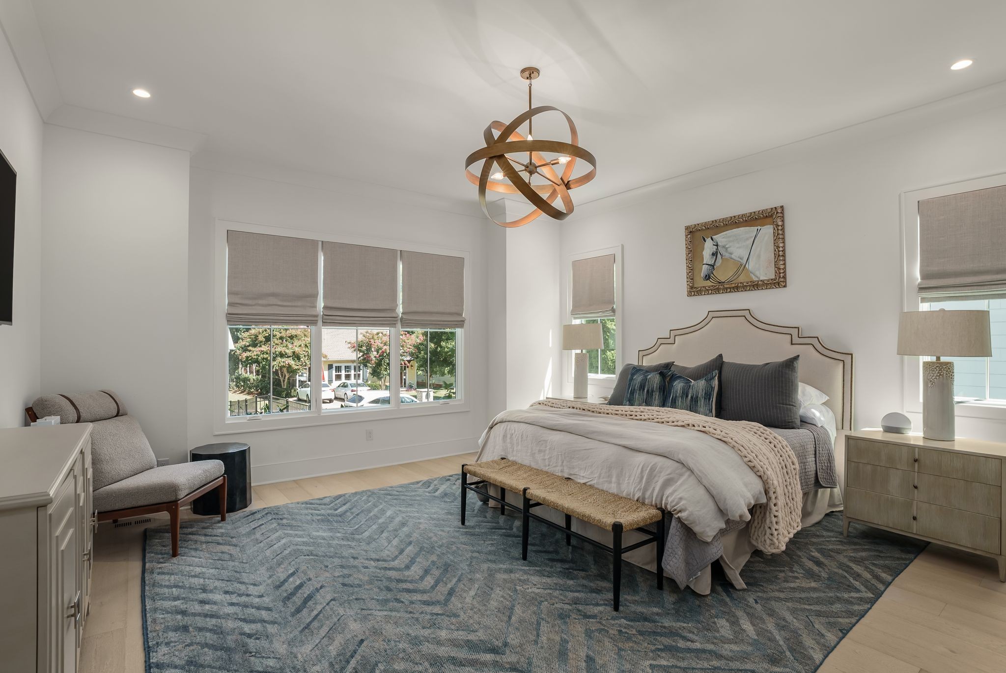 4909 Dakota Avenue Nashville, TN 37209 - Photo 19 of 39 a bedroom with a bed and a chandelier