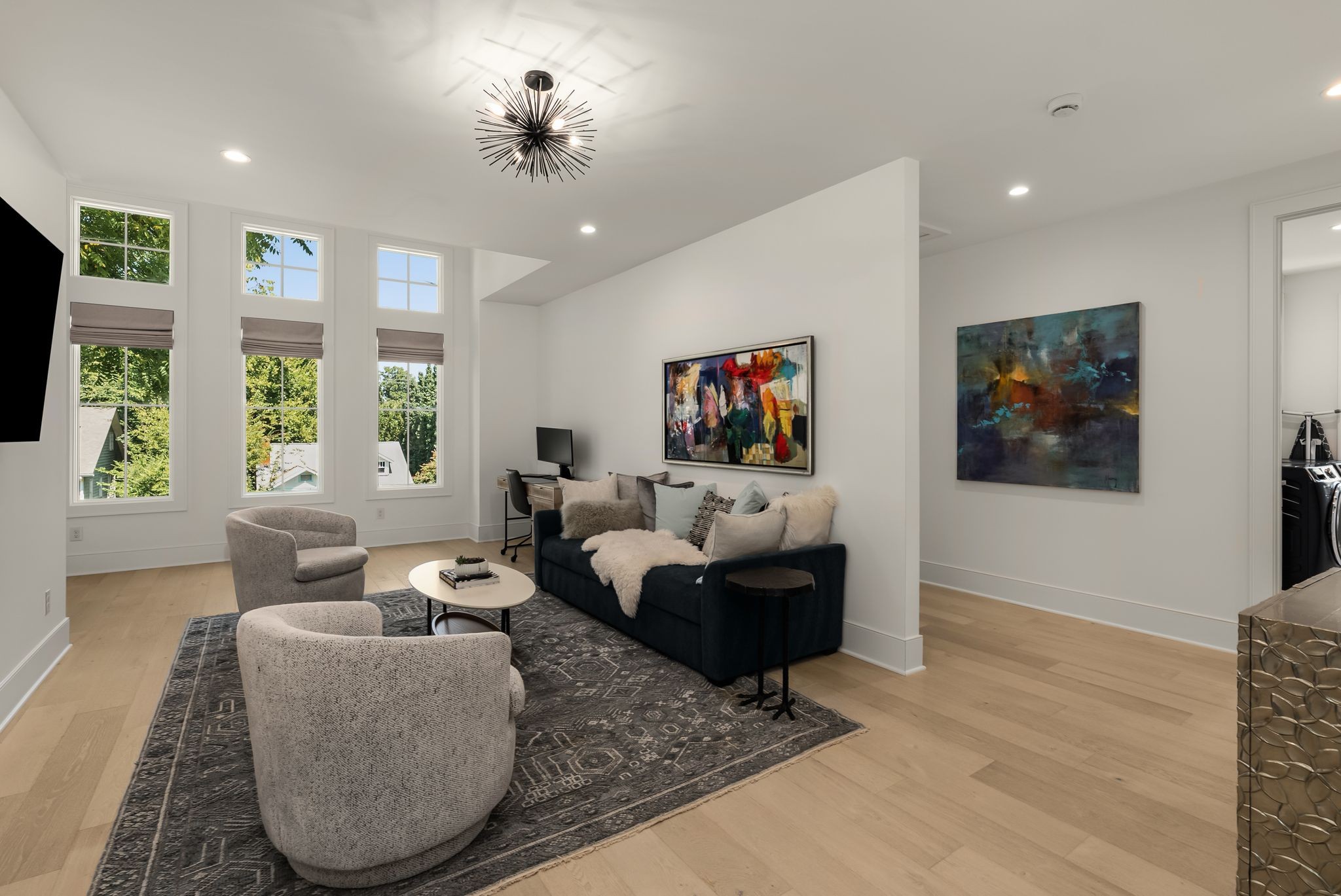 4909 Dakota Avenue Nashville, TN 37209 - Photo 24 of 39 a living room with furniture and a flat screen tv