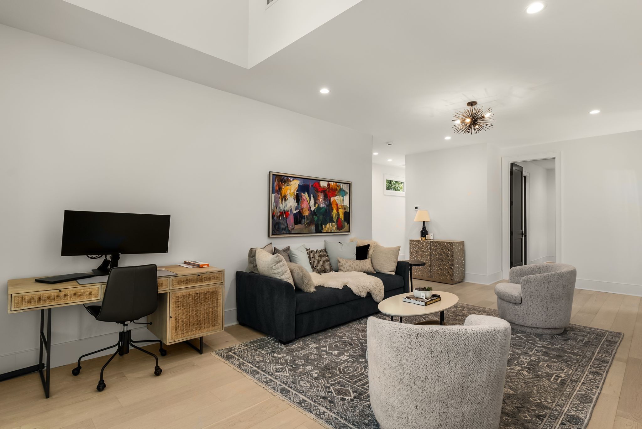 4909 Dakota Avenue Nashville, TN 37209 - Photo 25 of 39 a living room with furniture and a flat screen tv