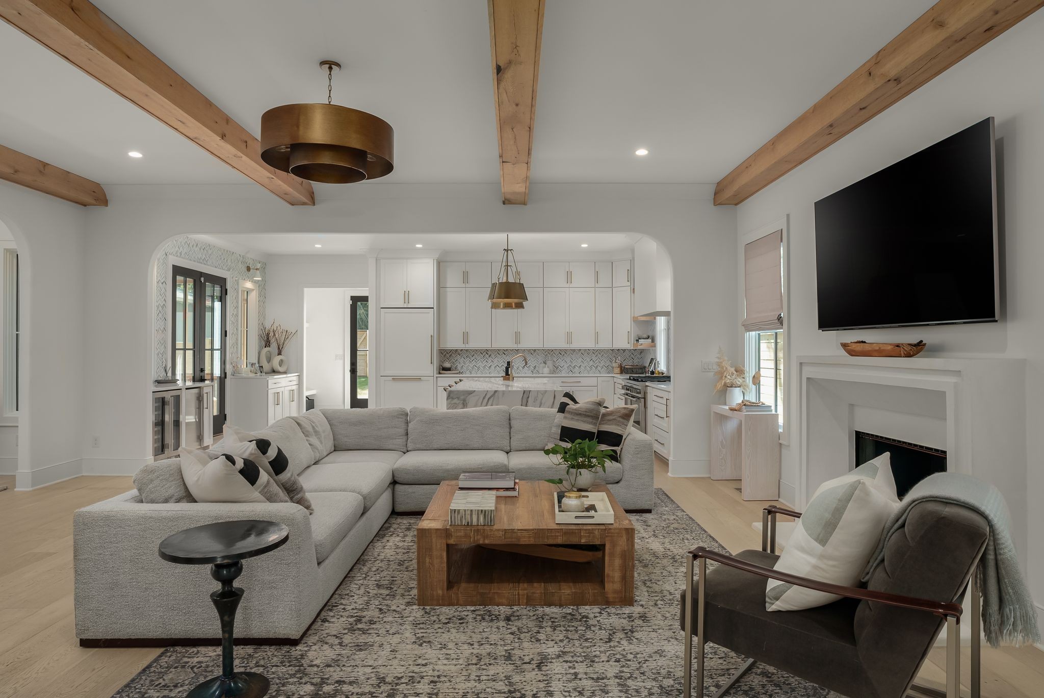 4909 Dakota Avenue Nashville, TN 37209 - Photo 5 of 39 a living room with furniture a fireplace and a flat screen tv