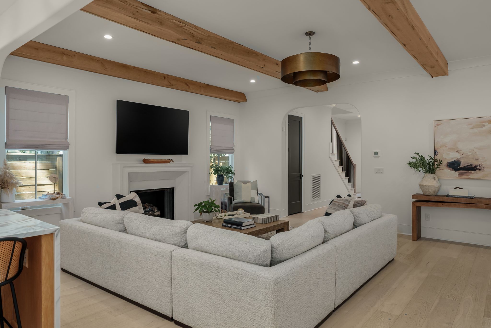 4909 Dakota Avenue Nashville, TN 37209 - Photo 6 of 39 a living room with furniture a fireplace and a flat screen tv