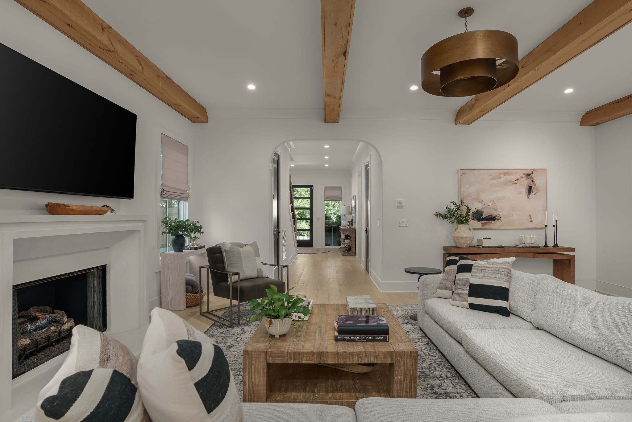 4909 Dakota Avenue Nashville, TN 37209 - Photo 7 of 39 a living room with furniture and a flat screen tv