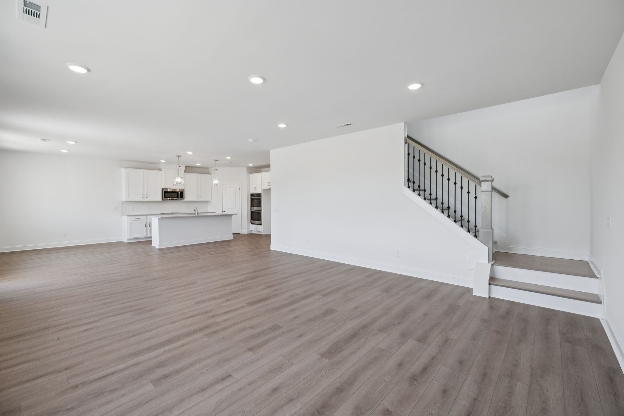 140 Emeline Way Mount Juliet, TN 37122 - Photo 12 of 35 a view of kitchen with wooden floor and electronic appliances