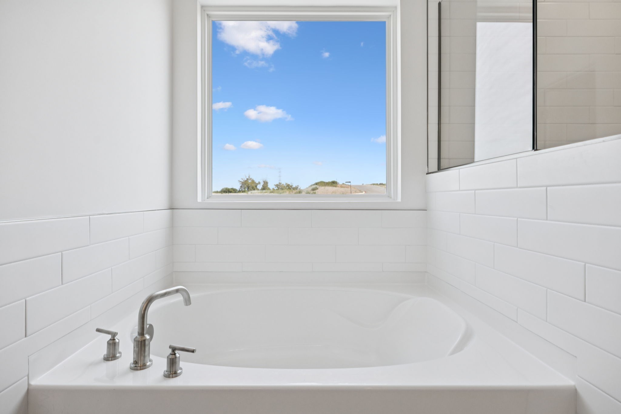140 Emeline Way Mount Juliet, TN 37122 - Photo 19 of 35 a bathroom with a bathtub