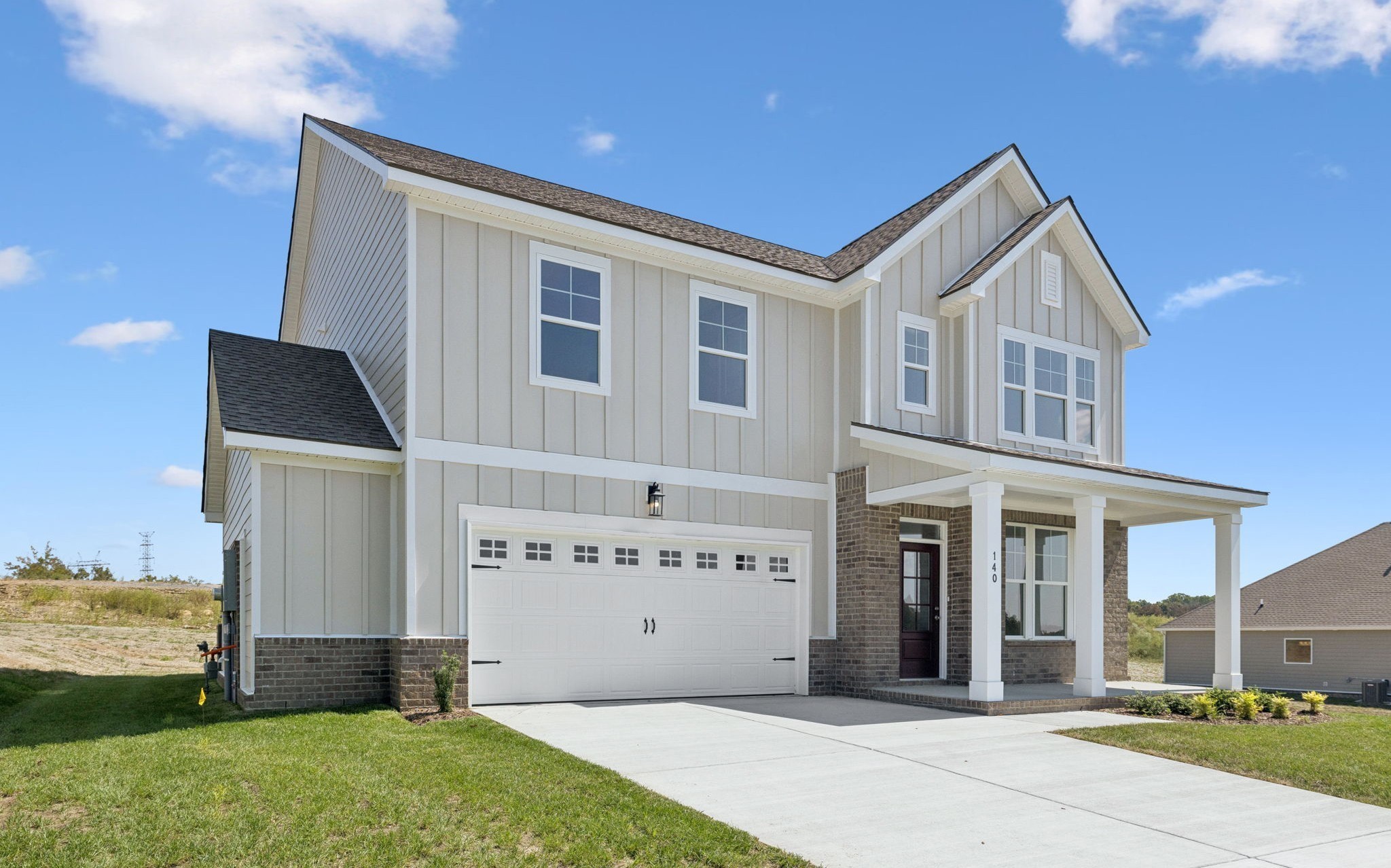 140 Emeline Way Mount Juliet, TN 37122 - Photo 2 of 35 a front view of a house with a garden and yard