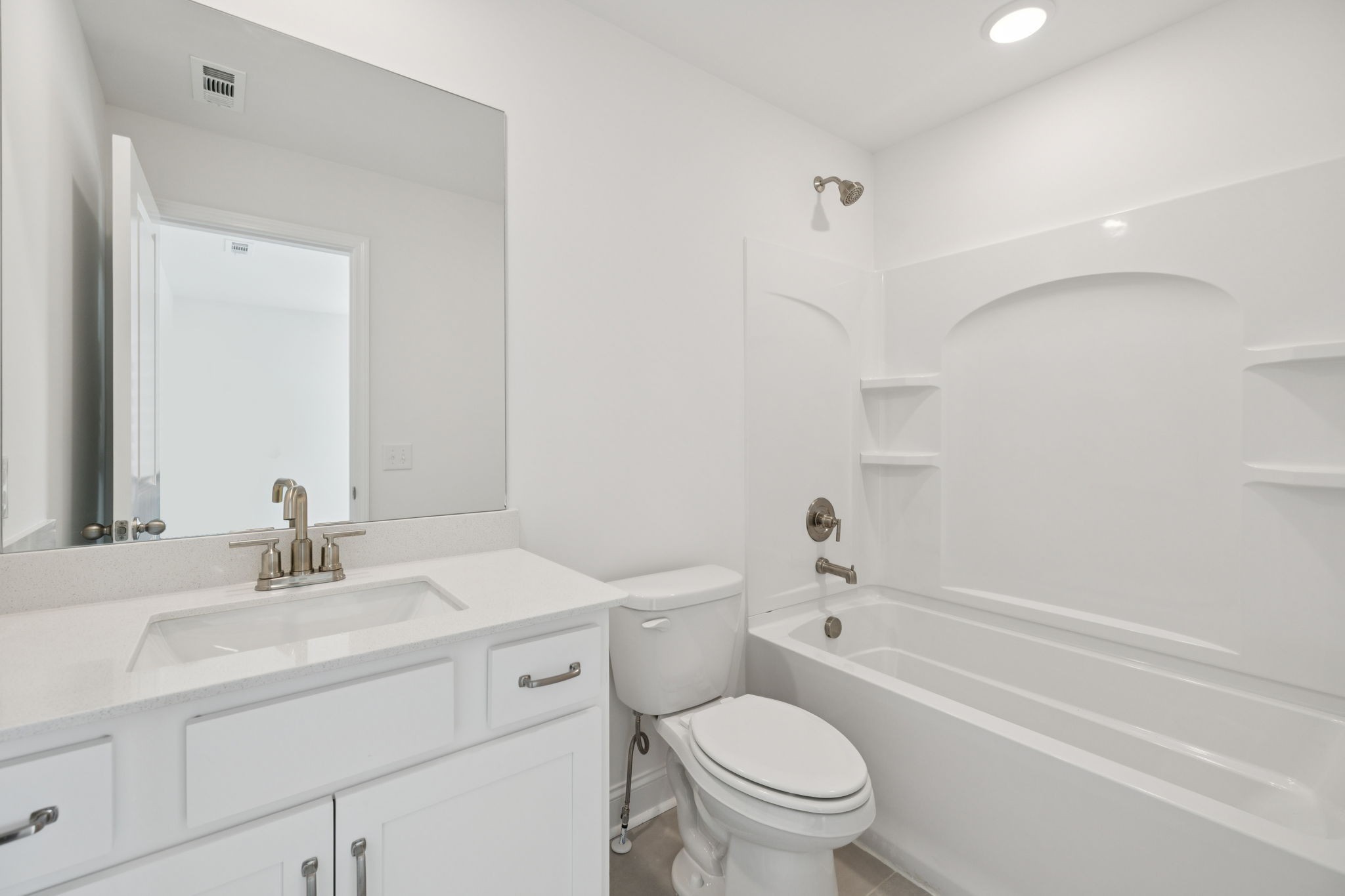 140 Emeline Way Mount Juliet, TN 37122 - Photo 23 of 35 a bathroom with a sink toilet vanity and shower