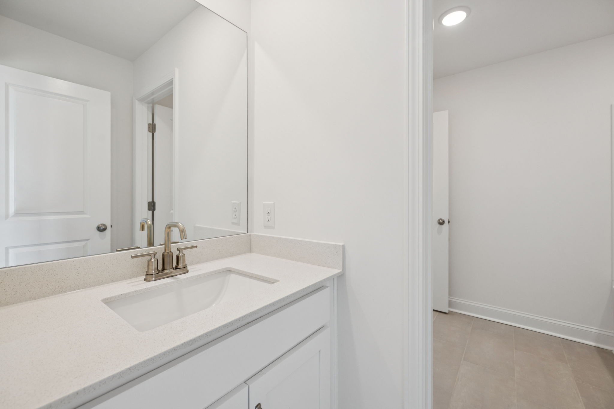 140 Emeline Way Mount Juliet, TN 37122 - Photo 25 of 35 a bathroom with a sink and a mirror