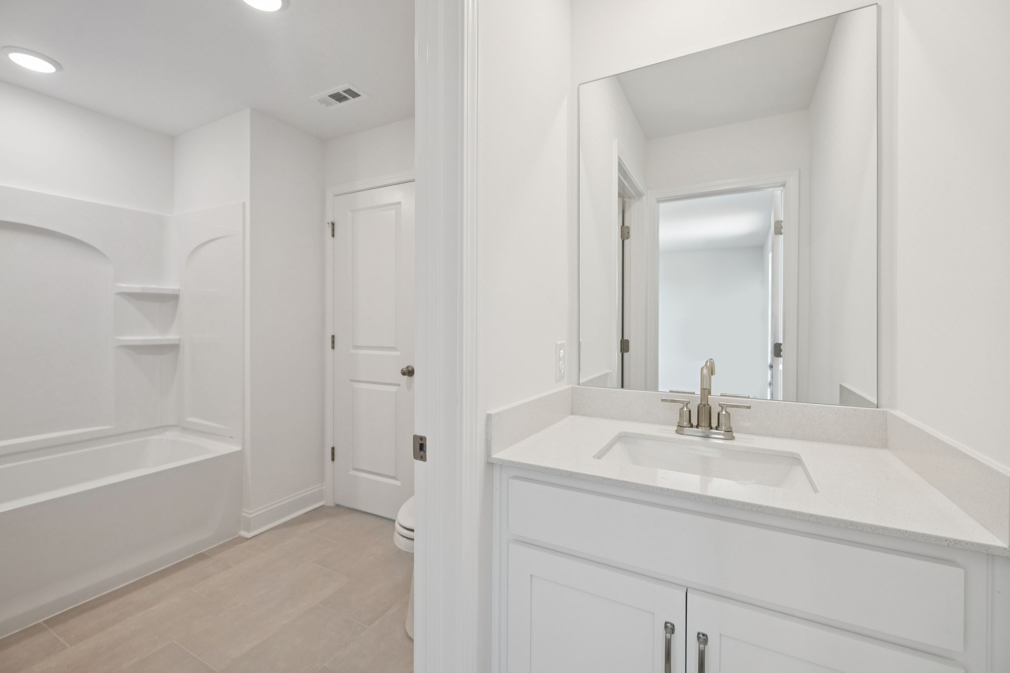 140 Emeline Way Mount Juliet, TN 37122 - Photo 27 of 35 a bathroom with a sink shower and a mirror