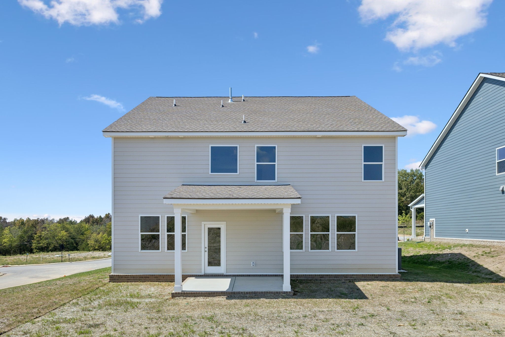 140 Emeline Way Mount Juliet, TN 37122 - Photo 30 of 35 a front view of a house with a garden