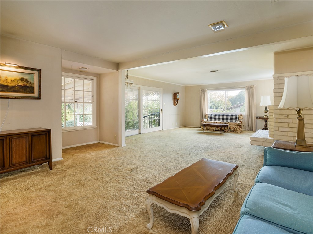 61 Ranchview Road Rolling Hills Estates, CA 90274 - Photo 11 of 44 a living room with furniture and a fireplace