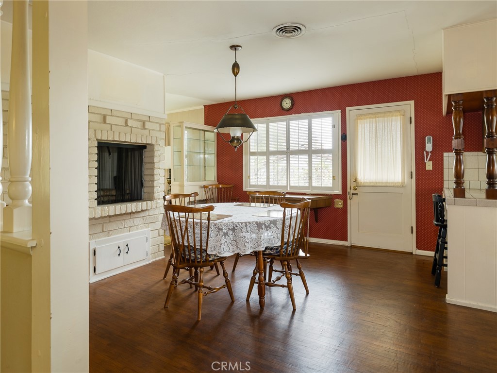 61 Ranchview Road Rolling Hills Estates, CA 90274 - Photo 13 of 44 a view of a dining room with furniture window and wooden floor