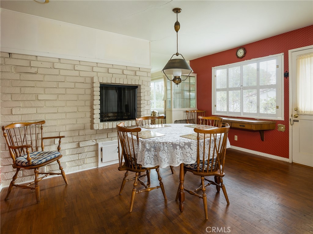 61 Ranchview Road Rolling Hills Estates, CA 90274 - Photo 14 of 44 a view of a dining room with furniture window and wooden floor