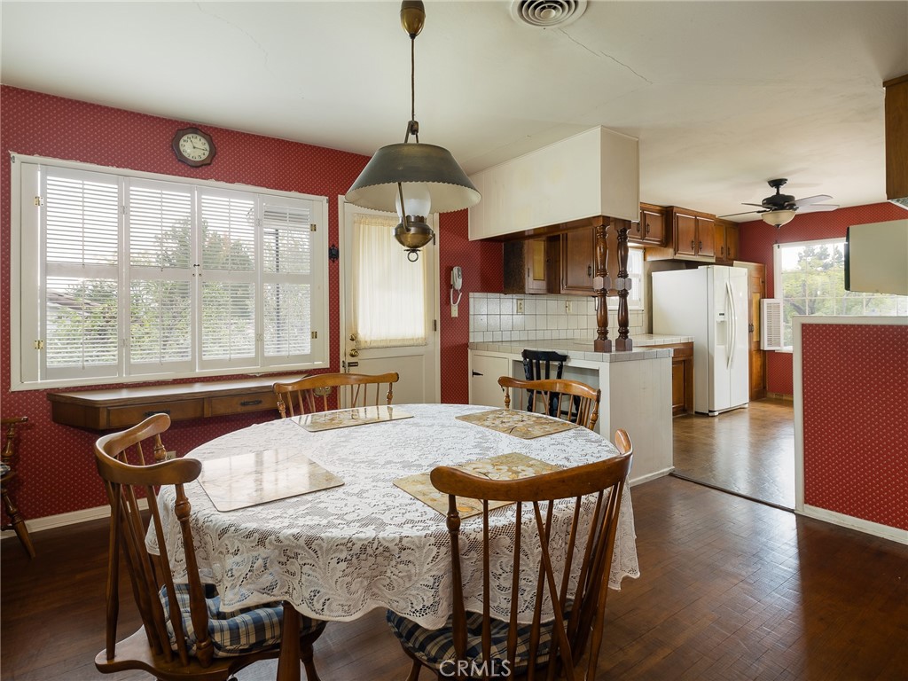 61 Ranchview Road Rolling Hills Estates, CA 90274 - Photo 15 of 44 a view of a dining room with furniture window and wooden floor