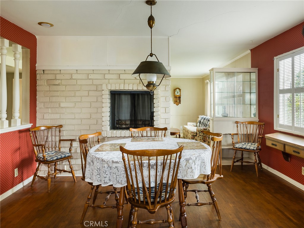 61 Ranchview Road Rolling Hills Estates, CA 90274 - Photo 19 of 44 a view of a dining room with furniture window and wooden floor